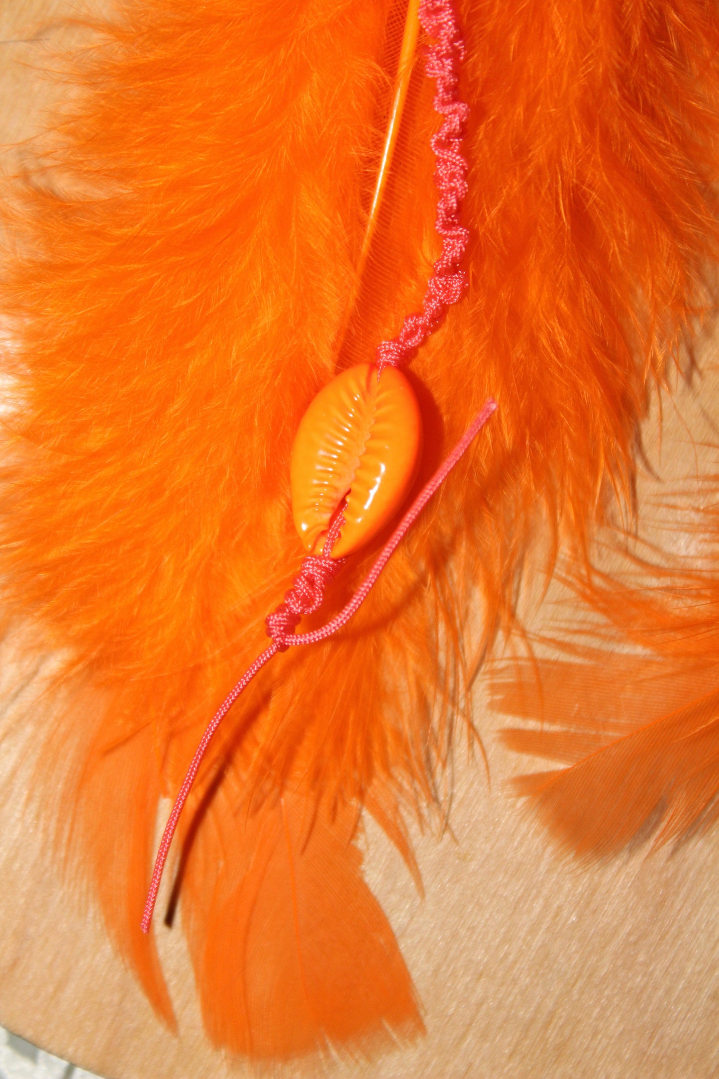Orange Cowrie Feathers
