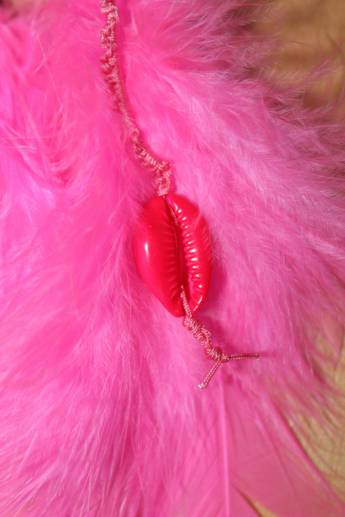 Neon Pink Cowrie Feathers